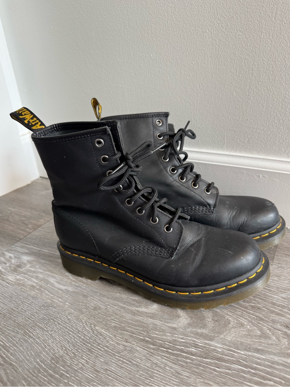 Women’s Dr. Martens Black Leather Lace-Up Combat Boots with Yellow Stitching